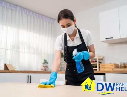 professional-cleaner-cleaning-the-kitchen-6-benefits-of-using-eco-friendly-products-for-diy-weekly-house-cleaning-in-singapore-weekly-house-cleaning-dw-part-time-helper-singapore